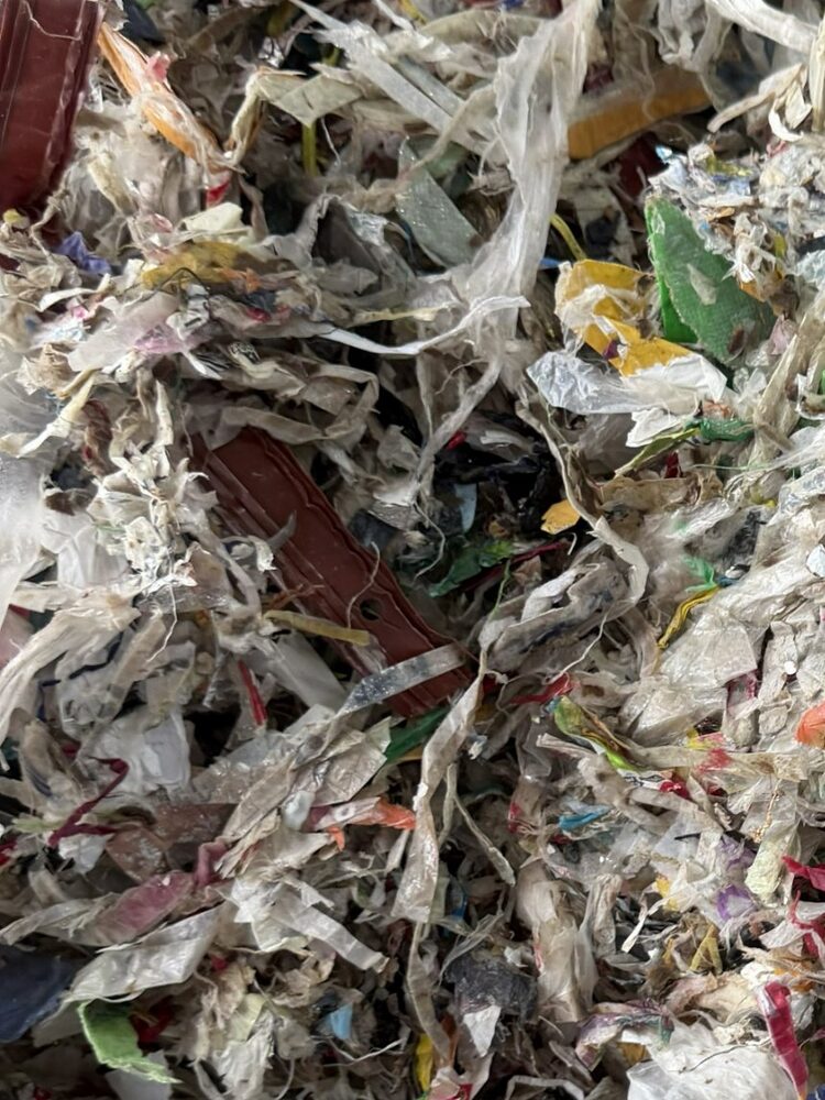 Shredded mixed plastic waste